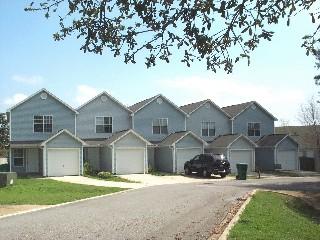 Two story townhome with a one car garage. Both bedrooms are upstairs with their own private full bathroom. Half bath downstairs. Lawn service and pest control included. Back yard is open and shared with the complex.  Sorry , no pets. All Coastal Realty Services residents are enrolled in the Resident Benefits Package (RBP) which includes renters insurance, HVAC air filter delivery (for applicable properties) and our best-in-class resident rewards program, and much more! More details upon application.