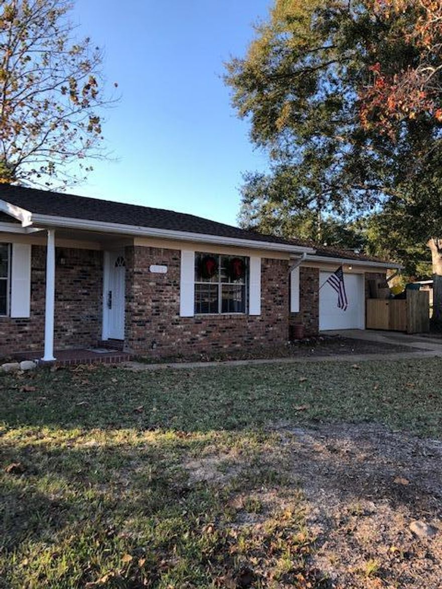 Welcome to this beautiful home located in Mary Esther. Everywhere you look, you will appreciate the care and detail that has gone into this home. There is a newly installed kitchen with brand new shaker cabinets and a lovely granite countertop, complete with a breakfast bar overlooking the family room. All new appliances in a stainless steel finish were installed as well as a new pantry for extra storage.You'll love the open and inviting family room just off the kitchen, with plenty of room for the family to gather. Gorgeous custom shiplap was made and installed on either side of the fireplace. The fireplace is a beautiful and useful focal point for this large room. There are sliding glass doors leading to the screened in porch and the spacious back yard, with newly laid sod.