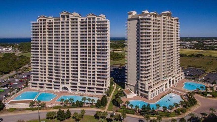 Beautiful 2 bedroom, 2 bath condo in beautiful Ariel Dunes II. Condo features spacious balcony, stained kitchen cabinets, stainless steel appliances, granite counter tops , tile floors in the kitchen and living areas with wood floors in the 2 bedrooms. From the balcony you have views of the pools, Gulf, lake and golf course. Ariel Dunes II features golf, tennis, Pool, sauna/steam room, exercise room, gated community, and of course deeded access to the beach. Conveniently located between US 98 and Scenic Gulf Drive.