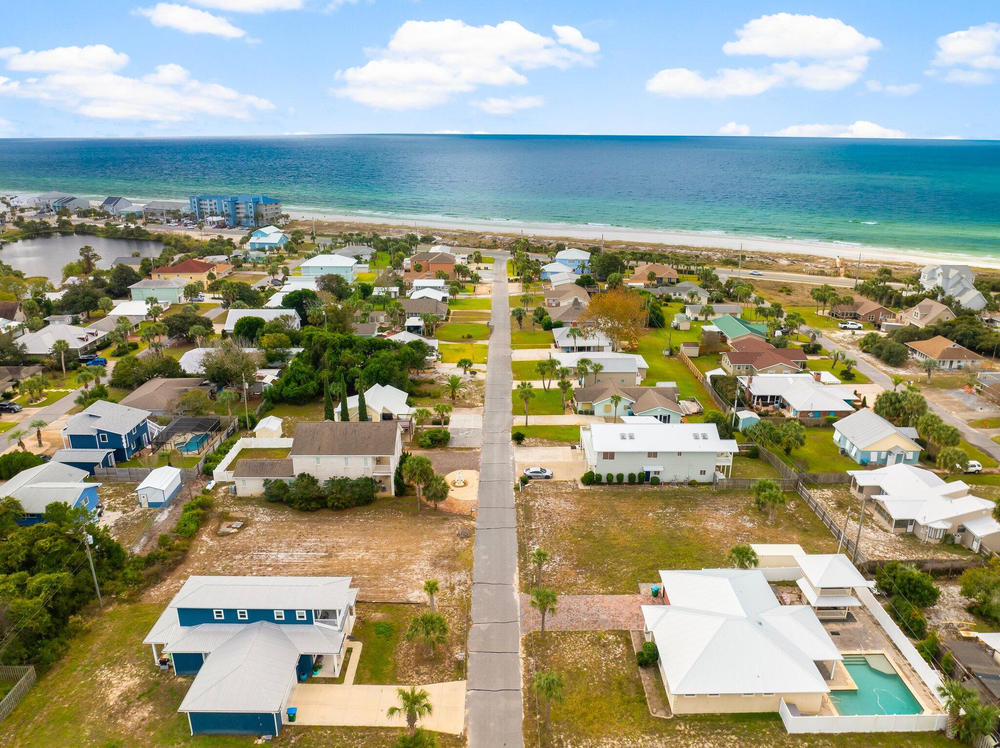 Build the beach home of your dreams on this exceptional lot located at 216 Monterey Ave in the sought-after Santa Monica neighborhood of Panama City Beach, FL. Positioned just a short walk from the pristine white sands of the Gulf of Mexico, this property offers the perfect canvas for coastal living at its finest. As part of the Santa Monica community, you'll enjoy access to a private, gated, and dedicated beach reserved exclusively for owners and their guests.Surrounded by vibrant local attractions, your future home will be in close proximity to the best of what Panama City Beach has to offer. Spend your days indulging in waterfront dining, shopping at Pier Park, or exploring exciting new destinations like the upcoming Topgolf. Whether you prefer a relaxing day on the sand or an afternoon of adventure, this property puts it all within easy reach. Don't miss your opportunity to create your own piece of paradise in this highly desirable neighborhood.