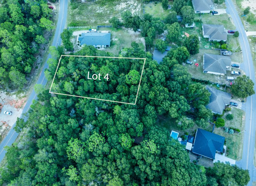 Gorgeous .42 acre lot ready for you to establish your dream home located in DeFuniak Springs no far from Walton High School & less than 5 mins to town.
Restrictions are minimal. All single-family mobile homes, new construction or tiny home allowed. No minimum sqft requirements. This lot backs up to a small creek/wetland are in the back corner. 

*Flood Zone X 
*WaltonCo GIS Shows No Wetlands
*Electric available at the road
*City Water (Process of confirming availability)
*Septic Required.
*No Active HOA

Historic DeFuniak Springs is a love town that centrally located off the I-1o interstate on the south side and Hwy 90 towards the north side. From this beautiful city, you are approx. 10 mins to less than hour from Freeport, Crestview, Bonifay, Niceville, Destin, Marianna, Panama City Beach.... making it an easy commute to work and great proximity to all major shopping centers, fine dining, & entertainment.  Best part is you are less than hour to the beautiful white sandy beaches of Florida famous Emerald Gulf Coast & Crab Island. 

Buyer needs to verify building codes, zoning regulations, wetlands & flood zones, etc with proper local authorities to ensure buyer will be able to utilize the property for intended use.

All markings shown in photography & ground are for estimation purposes only. They are not to be relied on as actual property lines.  Updated survey to mark boundaries is recommended as part of buyer's due diligence.  The seller has provided an old survey for your review.

*There were restrictions recorded on the property on June 18, 1976.  At the time it of recording, it states they are to run with the property for 30 years.  To the best of our research, there have not been any subsequent rerecorded restrictions. There is no active HOA.  We are not certain of the validity or enforceability of these restrictions.  It is advised to seek attorney advice, if this is important for you to know the legal advice concerning status.