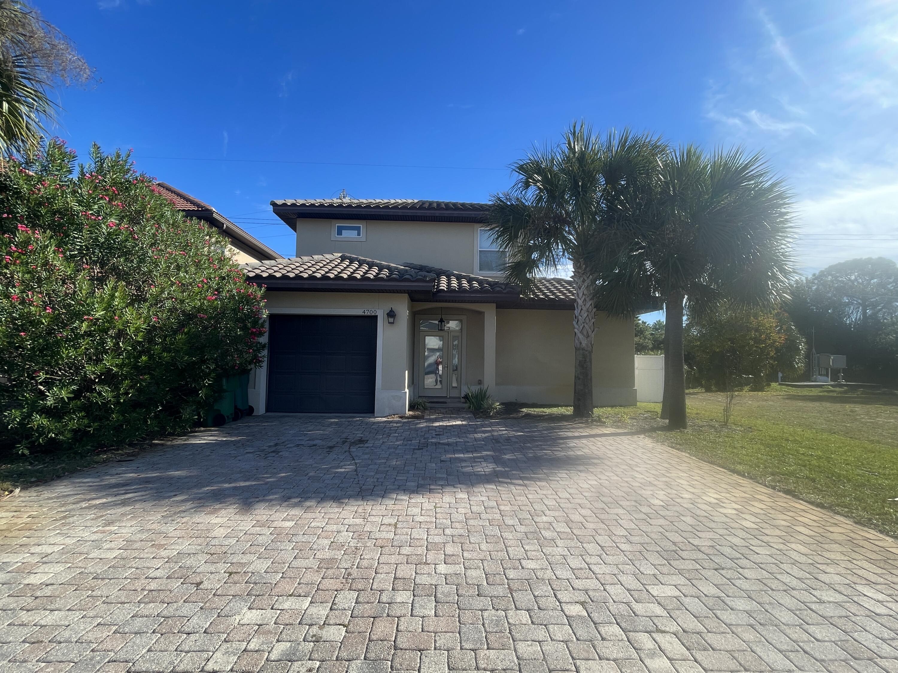 Super cute 3 bedroom, 3.5 bath home in a gated community (with community pool) in the heart of Destin. On the first floor of this lovely rental is a spacious living room with with recessed lighting and double doors leading out to an open patio and the spacious back yard (not fully fenced); cherry cabinets, granite counter tops, and stainless appliances (including a flat cooktop stove) are featured in the kitchen, which also boasts a breakfast bar and pantry. Also on this level are a half guest bath and the primary suite, which has tray ceilings, its own double doors leading outside, and an en suite with a double vanity. Upstairs are a small loft area and two nicely sized guest bedrooms, each with its very own full bath. There is a 1-car garage, and the washing machine/dryer are included in