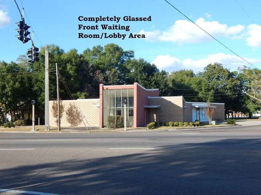 HWY 90 FRONTAGE! LOCATED CLOSE TO THE COURT HOUSE And at a Red Light for easy access! This is the front larger portion of the building. Perfect for a Clinic, Doctor's Office, Attorney office, Title Company or any company needing a lot of offices/exam rooms or LARGE SQUARE FOOTAGE. The building is divided into two separate spaces. The smaller rear space is currently leased The larger space that faces Hwy 90 is ready for occupancy and includes 9 offices/exam rooms, 3 baths, large lobby/waiting room, and Reception area with counter-tops. Tenant to verify Measurements, Zoning and anything else of Importance. The exact sq ft is to be determined. The total sq ft of the building is listed with the property appraiser as 4294 sq ft (this listing is the front large section of the building.
