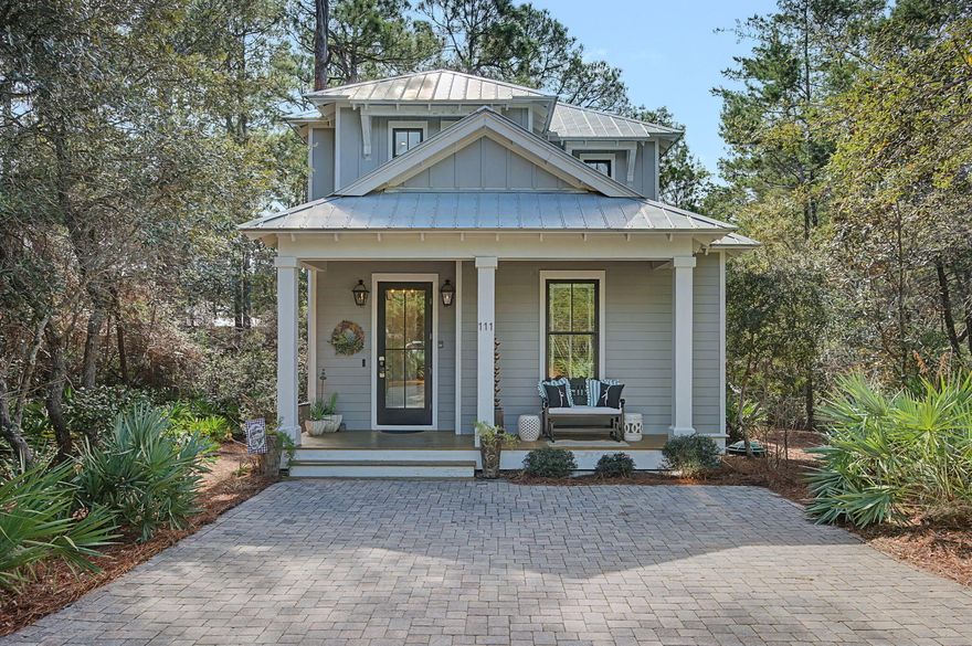 Tucked away in the exclusive, gated Hammocks of Seagrove community--just minutes from WaterColor, Seaside, and a half-mile from the nearest beach access--this immaculate luxury retreat offers the perfect blend of charm,privacy, and coastal living. A winding paved driveway meanders through lush greenery, leading to a shaded front porch that exudes serenity and seclusion.Inside, the home is a masterpiece of understated sophistication.Distressed hardwood floors, lofty 10-foot ceilings, and abundant natural light create an airy, welcoming ambiance.Crisp white shiplap walls and paneled doors provide both character and durability.The open-concept living, dining,and kitchen areas are thoughtfully positioned at the rear of the home, seamlessly connecting to a sprawling screened porch... read ''more'' Here, you'll find yourself immersed in the tranquility of the surrounding preserve, enjoying the ultimate indoor-outdoor lifestyle.

Picture yourself unwinding in this outdoor oasis, enveloped by towering trees and the soothing sounds of nature, with forever-protected green space as your backdrop. The modern kitchen is a chef's dream, featuring sleek quartz countertops, Bosch appliances, a gas range, and a spacious breakfast bar perfect for casual gatherings. On the first floor, a primary suite offers a tranquil retreat with transom windows for extra light, a custom walk-in closet, dual vanities, a soaking tub, and a separate walk-in shower.

The second floor offers even more luxury. A true primary suite with a private treetop balcony provides a serene escape for reading or relaxing, while the charming bunk room, complete with sleeping space for four and a private bath, is perfect for family or guests. Ample storage throughout ensures everything has its place.

Beyond the home, the Hammocks of Seagrove community enhances the lifestyle with two sparkling pools and a scenic nature boardwalk. Best of all, you're just a short stroll from the breathtaking white sand beaches and emerald waters of the Gulf. This is more than a houseit's a gateway to the idyllic, coastal lifestyle you've been dreaming of whether a full time home, second home, or short term rental investment.
