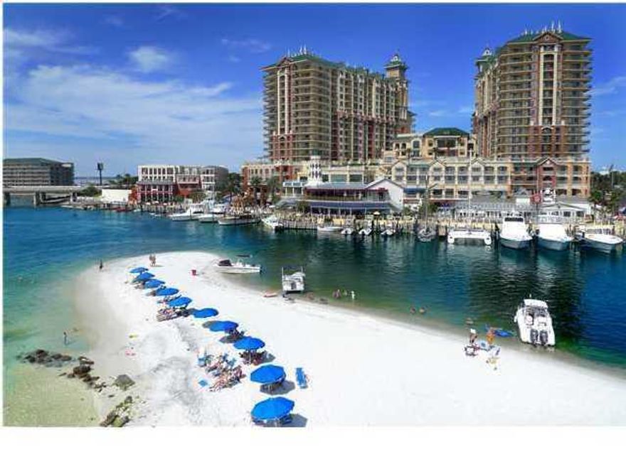 LOCATION,LOCATION,LOCATION!!!This gorgeous renovated 2 bedroom 2 bath condo is located in one of the most desired areas of Destin .The views are amazing!You can sit and enjoy a nice sunset dinner while looking over the East Pass, Crab Island,and the Destin Harbor.This condo has a large covered balcony for entertaining, and views from almost every room.Take a water taxi to the Harbor Walk Village and AJ's. Enjoy your private beach. It just doesn't get better than this!This condo easily sleeps 10 people and would make a great investment property!!!Fully Furnished and ready for summer!!