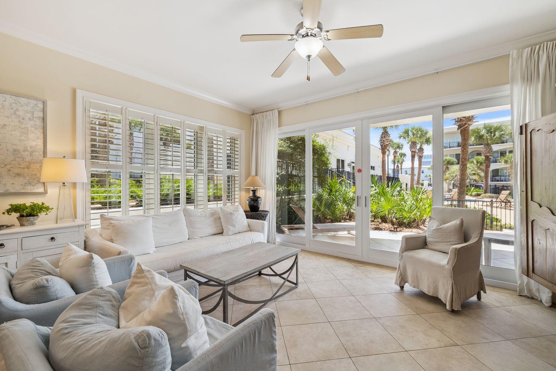 Rare offering of ground floor, corner poolside unit closest to beach walkover and fitness center with southern facing windows all along the side supplying lots of light! One of the top poolside rental revenue producers at Adagio, a sought-after beach resort on 30A. Ground floor units are the most requested by renters for ease of coming & going & children. Featuring three large bedrooms with an additional bunk room cleverly concealed off the hallway to create a fourth sleeping area. Bedroom floors have been updated to a lovely warm wood. Enjoy resort-style amenities at your private beach with umbrella service, including a Gulf-front infinity-edged pool, 8,000 sq ft second waterfall pool right outside your patio, fitness center, grilling areas, dog walk, and gated security. Ideal as a second home, full-time residence, or high-demand rental. This unit is on the Adagio 30A onsite property management program. Walk to popular restaurants, bistros, live music, health food store, bakery, yoga, spa, shops, all along a bike path!