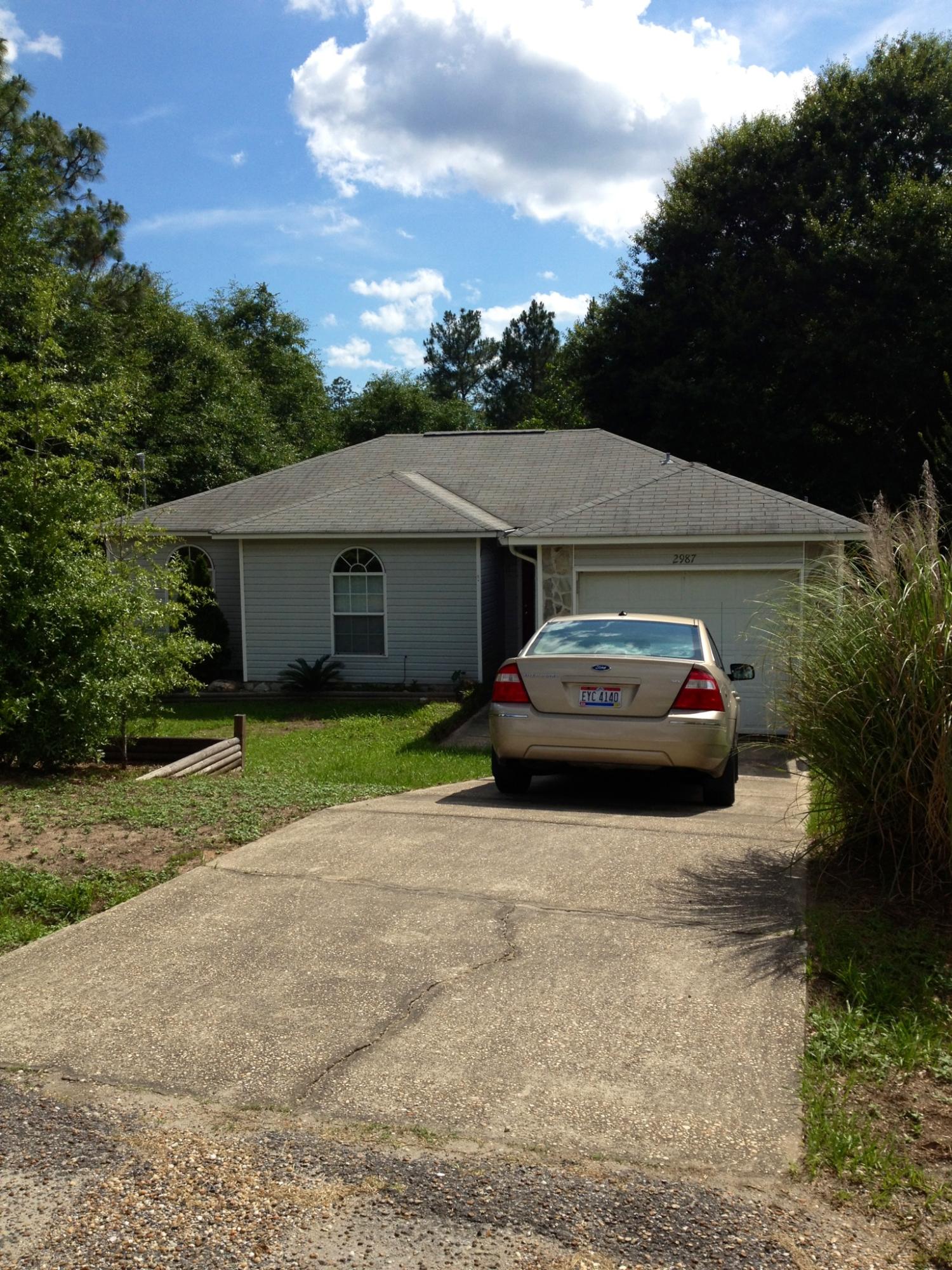 Very cute 3 bedroom 2 bath home in quiet neighborhood in South Crestview. New wood laminate floors and newer appliances. House has a 1 car garage with electric door opener. Large deck on back with huge wooded lot behind fenced area. Neighbors are super nice. This is a wonderful home. Lots of privacy and a country feel. Located south of I10. Easy to get to either Duke Field or Eglin AFB.