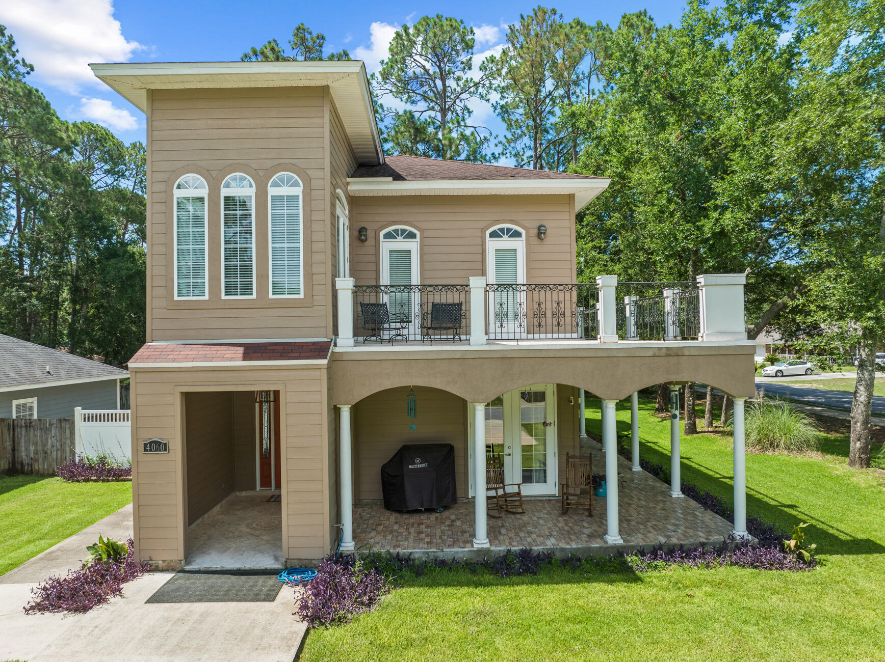 Welcome to your spacious dream home in the heart of Niceville! This beautifully updated 3-bed, 2.5-bath  residence features a massive wrap-around porch and a second-story balcony, perfect for entertaining or relaxing. The grand room boasts coffered ceilings, while the formal dining room features tray ceilings. The chef's dream kitchen is equipped with custom cabinetry, granite countertops, double refrigerators, double ovens, a professional gas range with a pot-filler, and a beautifully tiled backsplash.The interior includes tiled floors in the kitchen and foyer, and hardwood flooring throughout the rest of the house. Seven sets of French doors flood the home with natural light and offer convenient access to the patio and balcony. All bedrooms are located on the second floor, each with balcony access. The master suite includes an elegant ensuite with his and her closets, separate vanities, custom cabinetry, granite countertops, a walk-in shower, and a Jacuzzi tub. The additional bedrooms share a Jack and Jill bathroom with a double vanity.

Enjoy evenings on the porch or soak in the Jacuzzi tub after a long day. The home has a freshly painted interior. Outdoors, new sod, an irrigation system, and fencing complete the experience. Washer and dryer convey, and many furnishings are negotiable! VA Loan Assumption at 2.8% available with a reasonable offer. Seller will pay for a new roof with an acceptable offer. Seller will pay for home warranty. Seller will provide a $500 landscaping credit. This house is full of elegance and sophistication. Come check it out today!