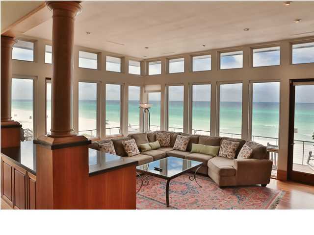 This home has BREATHTAKING GULF VIEWS!! Sitting on 93' of GULF FRONT, the property is 1.2 acres in ''PARADISE'' ! The second floor (main level of living space) has a solid wall of floor to ceiling windows that provide gorgeous views of the pristine beach and Deer Lake State Park's seclusion.... You can even see Watersound a mile or so away. CUSTOM BUILT by ALAN FICARRA and designed by Architect VICTOR BOWMAN, this home has the QUALITY CONSTRUCTION you would expect. TOP NOTCH finishes like SOLID CHERRY floors & cabinets, GOURMET KITCHEN with granite and 6 burner VIKING gas range & SUB-ZERO refrigerator & an elevator! Huge open area for Living & dining with a fireplace and surround sound music system. A wrap-around deck is perfect for watching SUNSETS or rocking to the waves. There