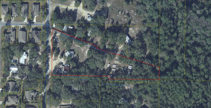 Great property consisting of 2.48 acres zoned for mixed use in the heart of Freeport. There are many possibilities with this property. Mixed use allows for commercial uses along with multi family residential.  There is a house on the property that was built in 1900 and renovated by the current owners in 2012-2013. For commercial uses the home could be used as an office. The property also has a pole barn that was being used as a marine repair shop. The Seller will remove the boats and parts located on the property prior to closing. The home and the shop are being sold in AS-IS condition.