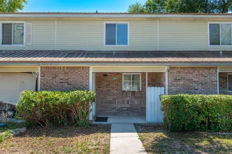FANTASTIC INVESTMENT OPPORTUNITY! 2 BD/1.5 BA townhome located off Racetrack Blvd. The living room, kitchen, half bathroom and laundry room are all located downstairs. The 2 bedrooms and full bathroom are located upstairs. The bedrooms are a good size. Small covered back porch and fenced backyard area. Buyer to verify all areas of importance.