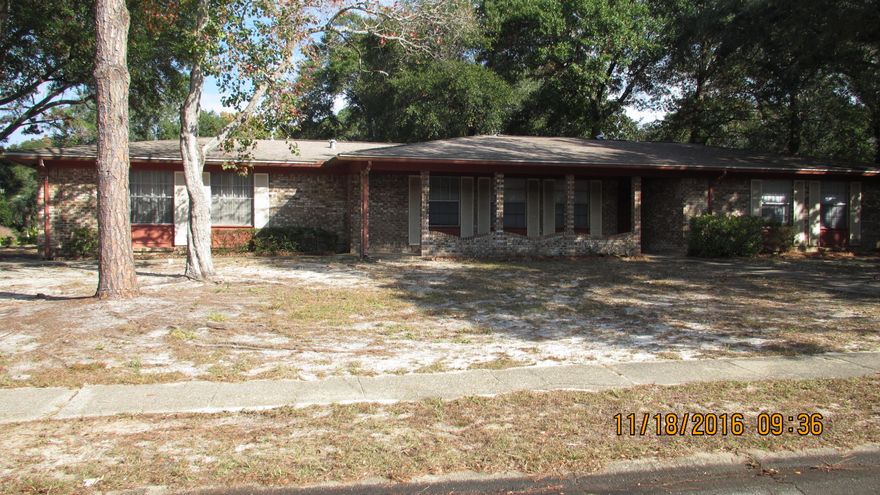Spacious home with cozy fireplace in the heart of Fort Walton Beach. Corner lot with fenced yard. Home offers living room AND family room with cozy, wood burning fireplace; breakfast area AND formal dining room. Plenty of space!! Any size pet allowed with non-ref pet fee (no aggressive breeds).