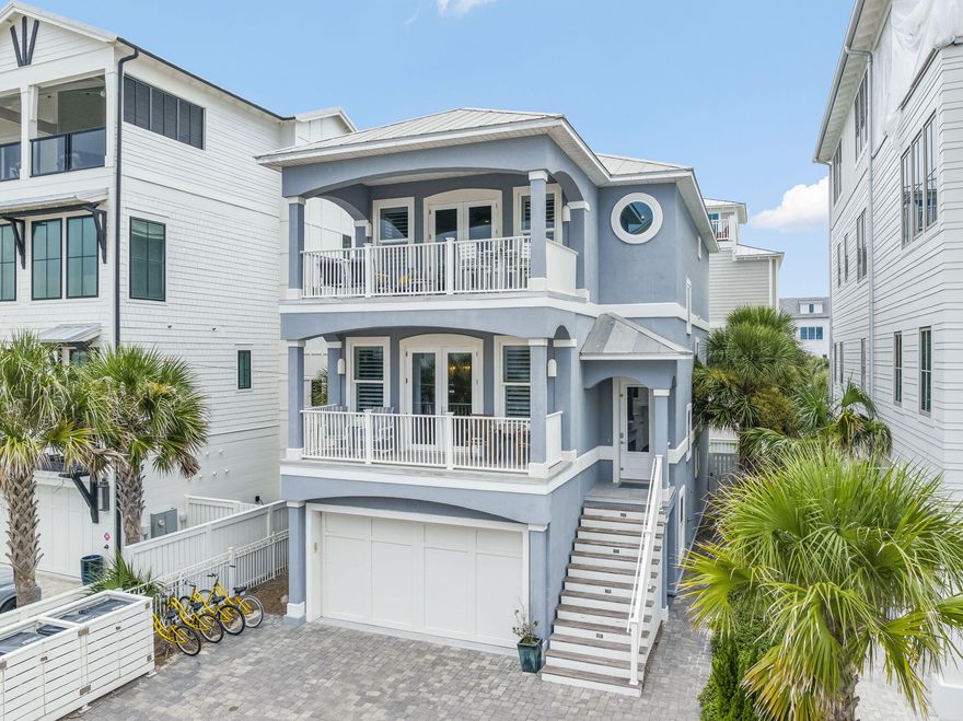 175 FEET OF PRISTINE BEACHFRONT SHARED BY ONLY 14 HOMEOWNERS -- NO CUSTOMARY USE ISSUES! This rare opportunity awaits at 93 Emerald Cove Lane, an exclusive coastal retreat in Inlet Beach with direct gated, deeded private beach access just one tier off the Gulf. Tucked inside a boutique HOA south of Highway 98 and less than a mile to 30A (via convenient back roads), this 5-bedroom, 3.5-bath home blends luxury, strength, and effortless beachside living. On the first floor, you'll immediately feel at home with light gray wood-tile flooring, soft blue shiplap accents, and an elevator that travels to all levels. This floor also includes a spacious guest suite with a fully remodeled bath featuring quartz countertops and custom tilework. The shiplap continues up the stairways to the second floor, home to three bedroomsincluding the true master retreat with a private lookout balcony and pristine Gulf views. The master showcases a wood accent wall, a Pecky Cypress barn door, a spa-like bath, and a fully built-out walk-in closet. Another full bath on this level continues the elegant coastal palette of blues, whites, and grays.

On the third floor, a light-filled open living space seamlessly connects the kitchen, dining, and living areas. Enjoy a gas fireplace, a cozy sitting room with French doors, and a redesigned chef's kitchen with stainless steel appliances. Step outside to the expansive balcony, perfectly positioned for breathtaking Gulf sunsets. This level also features an additional guest bedroom.

Forever-protected Gulf views stretch west over the state preserve, while the community pool is just steps away and rarely crowded. Built with ICF construction, this home is up to 10 times stronger and significantly more energy efficient than traditional builds. Additional upgrades include a backyard fenced patio, driveway pavers, and a refinished oversized garage with parking for 3-4 cars plus space for 3 more outside.

Ideally located in Inlet Beach, just east of Rosemary Beach and minutes from the boutiques and dining of 30 Avenue, this immaculate home is in like-new condition and would make a perfect full-time residence, second home, or investment property. Don't miss this rare chance to experience the very best of coastal luxury living along 30A.