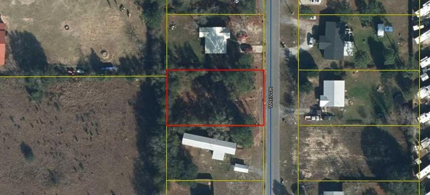Great lot perfect for building or mobile homes. King's Lake is just around the corner along with King's Lake campground. Water tap has been paid. Septic tank on property and has been recently pumped and inspected.  Electricity available nearby. All measurements must be verified by buyer.