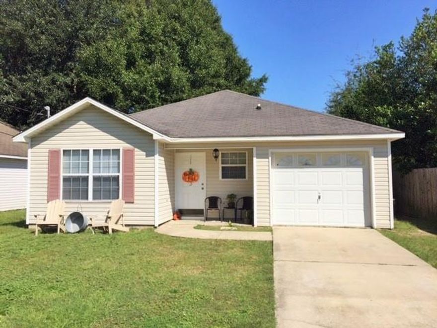 Perfect starter home! This 3bd/2ba home was just freshly painted a neutral tan color, laminate wood flooring in the main areas and master bedroom. Only 2 bedrooms are carpeted. Master features a private bath with lots of counter space and huge closet. Indoor laundry room, one car garage. Kitchen overlooks the living room so you will never miss a moment! Even room for a dining table. Backyard is perfect for pets or entertaining, fully fenced, large, and flat!