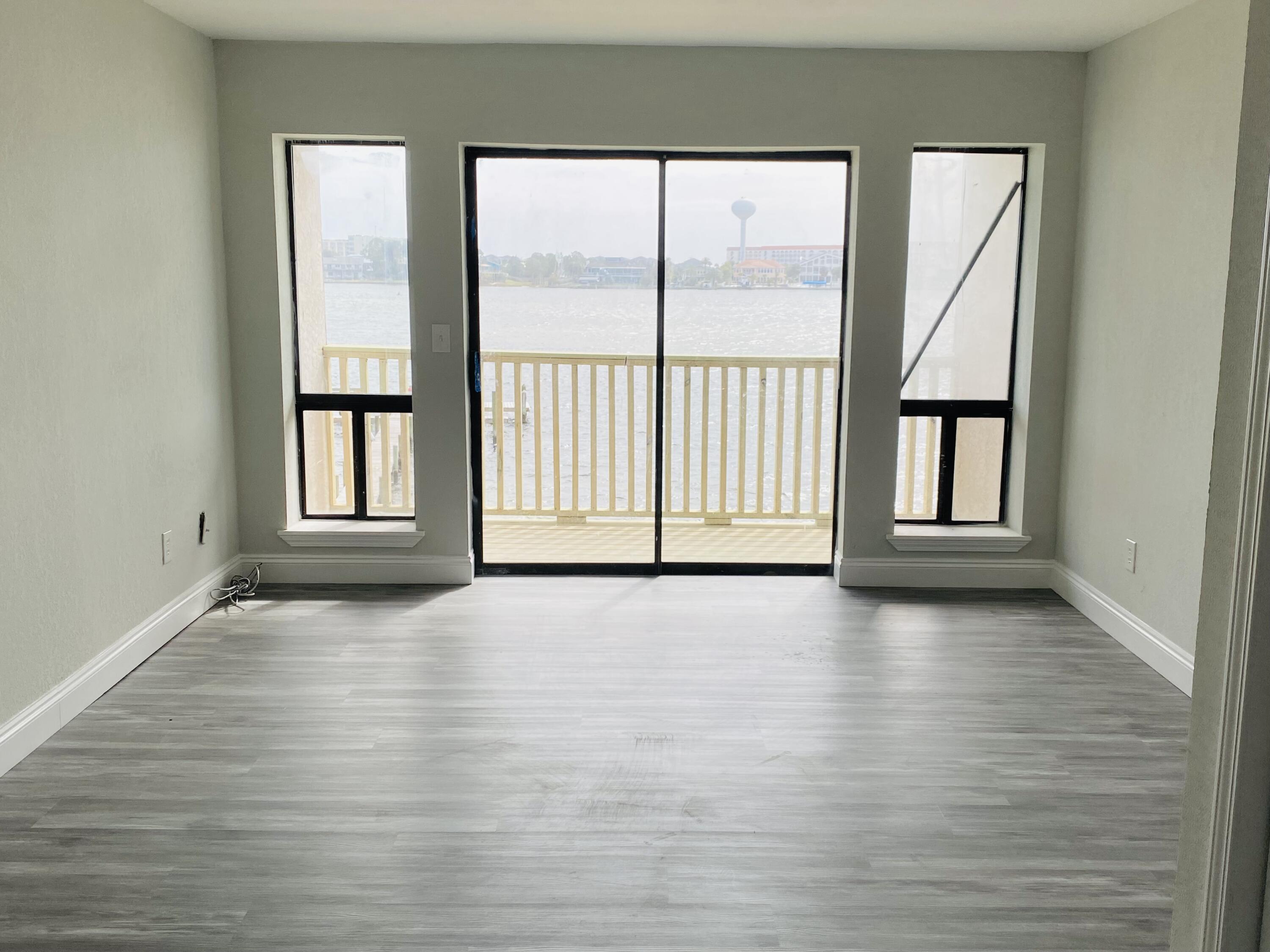 Beautifully remodeled condo on the water. This condo boasts luxury Vinyl flooring throughout entire home. First floor includes living room, kitchen, guest bathroom, and balcony. Second floor includes guest bedroom, master bedroom and full bath. Bathroom includes new vanity and beautifully tiled walk in shower with one line backsplash. Home also includes new LED lighting, fans, vanities, and fixtures. Kitchen will boast new White shaker cabinets mathched with an elegant quartz countertop.