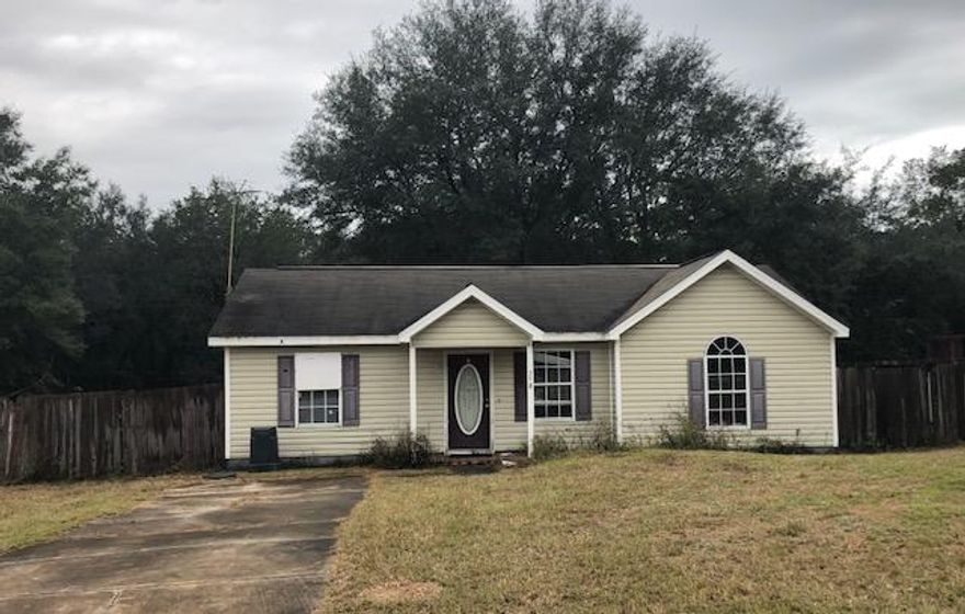 INVESTMENT OPPORTUNITY: Home will need some TLC but has great potential. Home is in need of new flooring in bedrooms, some light fixtures, inside AC unit, hot water heater, two new windows, and some sheet rock repaired. Washer and dryer are included with the home but owner has no knowledge of condition. Electricity and water are turned off so no knowledge of working condition of appliances.