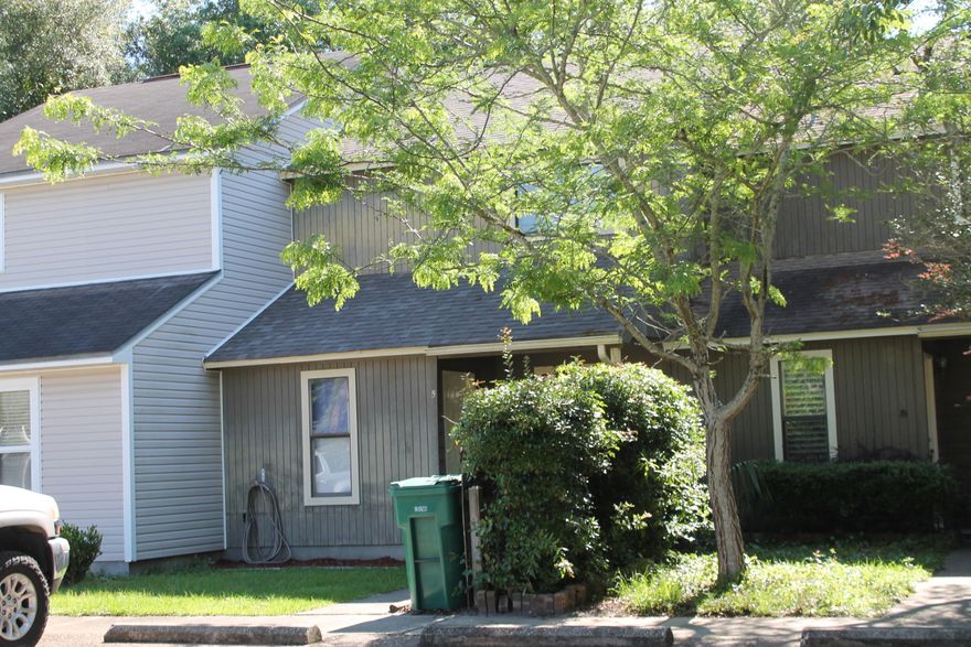 Cute townhome with lots of potential!! 2 bedroom, 2 1/2 bath with lots of light and beautiful back yard patio area for entertaining! Close to town and all the conveniences of shopping, banking, schools, etc. in a lovely neighborhood. Come check this cutie out!