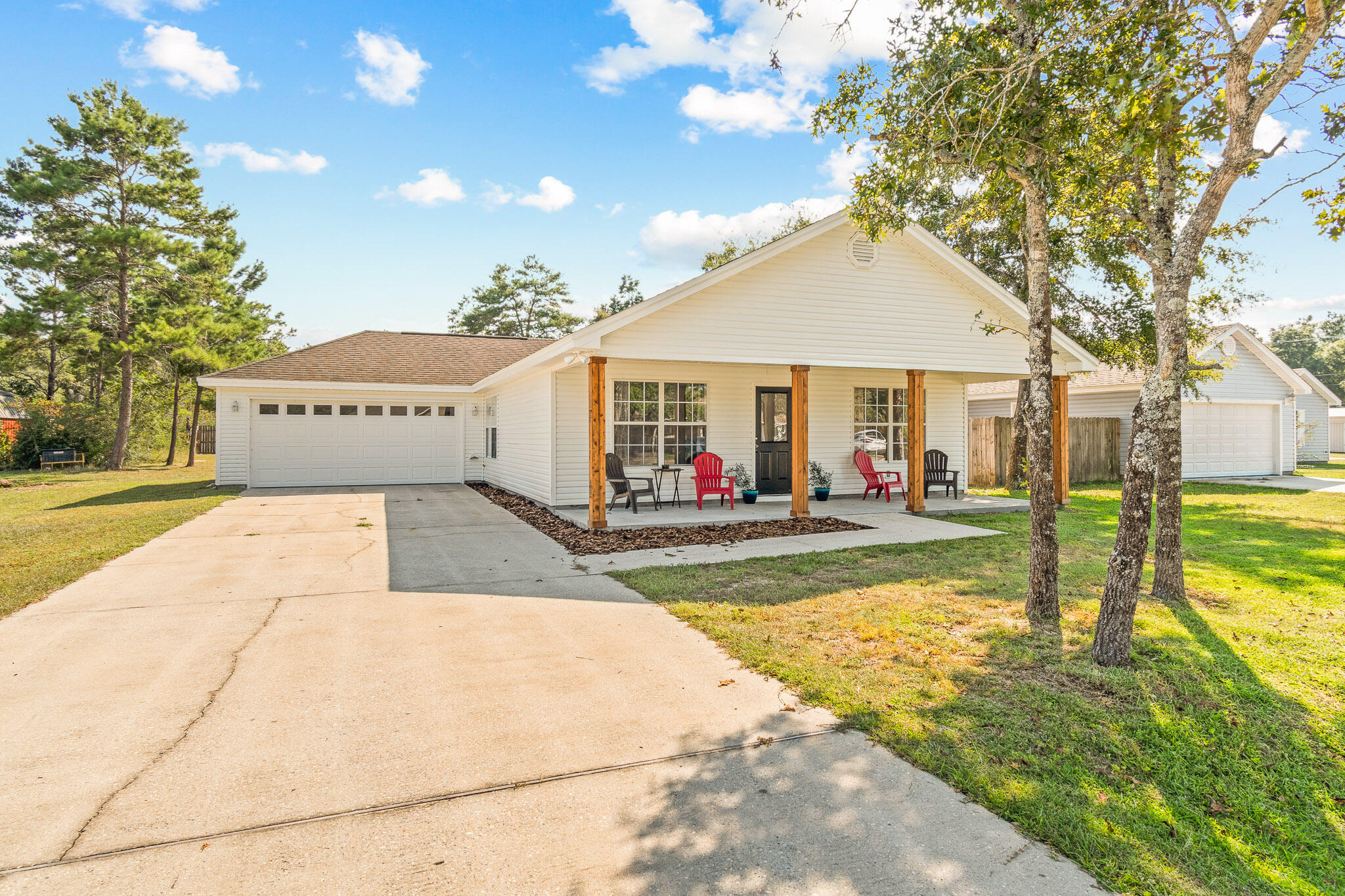 Welcome home! Charming 3 bedroom 2 bath rancher style home for sale on quiet street in Defuniak Springs! This adorable property features an inviting over sized front porch, perfect for enjoying your morning coffee! Spacious living/ dining/ Kitchen combo with breakfast bar. Tile floors and new carpet throughout. Roomy kitchen with beautiful back splash and ample cabinet space. brand new stainless steel appliances. Large master bedroom. Split bedroom layout for added privacy. HUGE back yard! Come take a look at this beautiful property today!