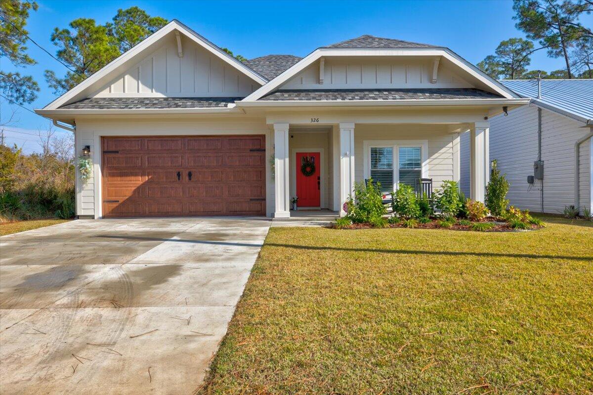 This 1 year old Coastal Cottage home is located just a quarter mile from the soft sugar sands of the Emerald Coast, on the West end of PCB. Spacious floorplan incl. 2 bed/2 bath, 2 car garage, screened Lanai, 9ft ceilings throughout, and tray ceilings in liv rm & master bedroom. This home comes partially furnished, and sleeps 6. Would make a great primary home, 2nd home, or rental property! This home includes SO MANY upgrades: Gas Fireplace, hardwood floors throughout (no carpet), plantation shutters, solid shaker cabinets with soft close, quartz counters, natural gas, gas cooktop/stove, gas-line for grill, irrigation system, fenced backyard, some furniture included, and is one of the few lots with city sewer, making room for a pool if desired. Extended Master bedroom and Screened Lanai