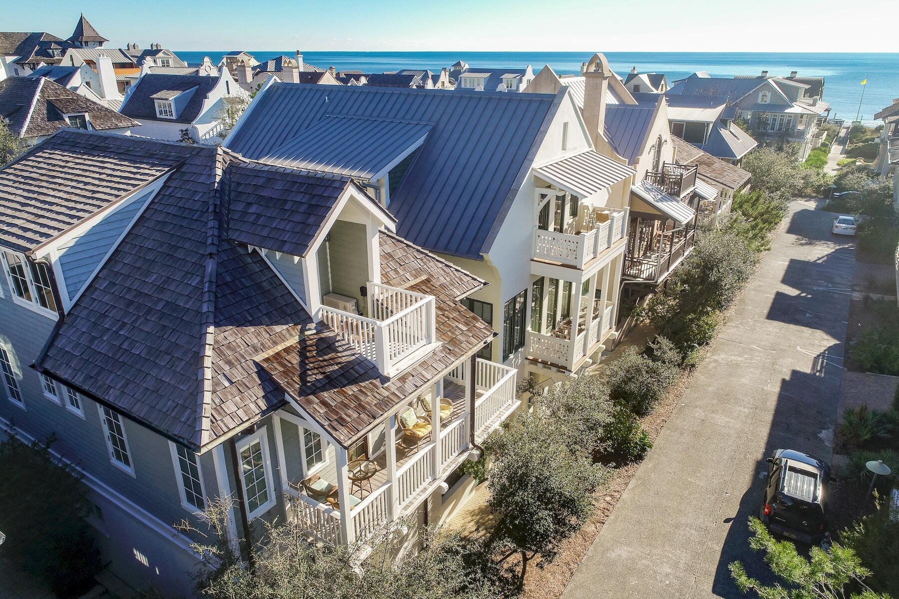 Designed by Michael Piazza, this popular Rosemary Beach cottage is located south of 30a, and close to the beach and village shops. Gulf views can be enjoyed from the 2nd and 3rd floor balconies. The Barbados Pool, one of four private Rosemary pools, is across the street. The beach is an easy one minute walk away. The three story main house offers Viking appliances, hardwood flooring, and wet bar. The first floor features an open living - kitchen floor plan with twelve foot ceilings. An abundance of windows offering natural light and two kitchen islands make this ideal for family gatherings.The second floor includes three en-suite bedrooms plus laundry room. Upon arriving at the third floor, you'll find a kids' delight with seven bunks and two separate bathrooms.