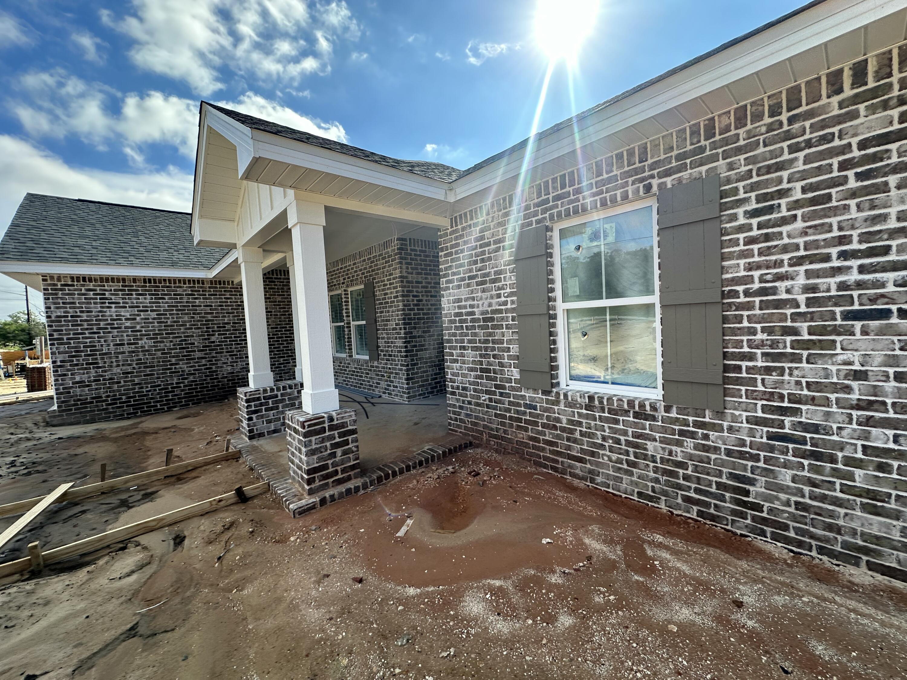 NEW Home South Crestview, under Construction! This home will be complete with exterior brick and hardy accents. The home has 4 bedrooms 2 baths. Open floor plan for family and friend get-togethers. Beautiful view from the picture window in the breakfast area. Side entry garage. Located at the South end of Crestview with new growth and just a short drive to beaches, bases, local schools, hospital, south Publix, restaurants, and Crestview Commons, Hwy 85 and I-10 are in close proximity to the property.Some of the photos are samples of the builders' previous homes.