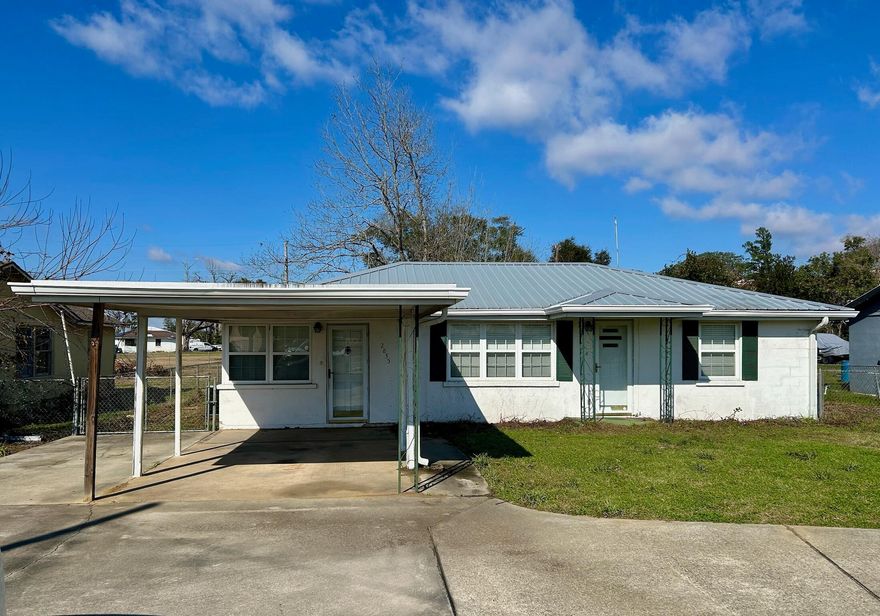 Cozy 2 bedroom 1 bath cottage located in Marianna. Home is a solid block home and could easily be turned into a 3 bedroom. The back yard is fenced. Kitchen has lots of storage. Bedrooms have carpet. Wet areas have tile and remaining of the home has Laminate flooring. Some updates have been done. Metal roof installed in 2022 along with having windows resealed. Sellers have never occupied this home, it was used as a rental.  Come check out this charming home.