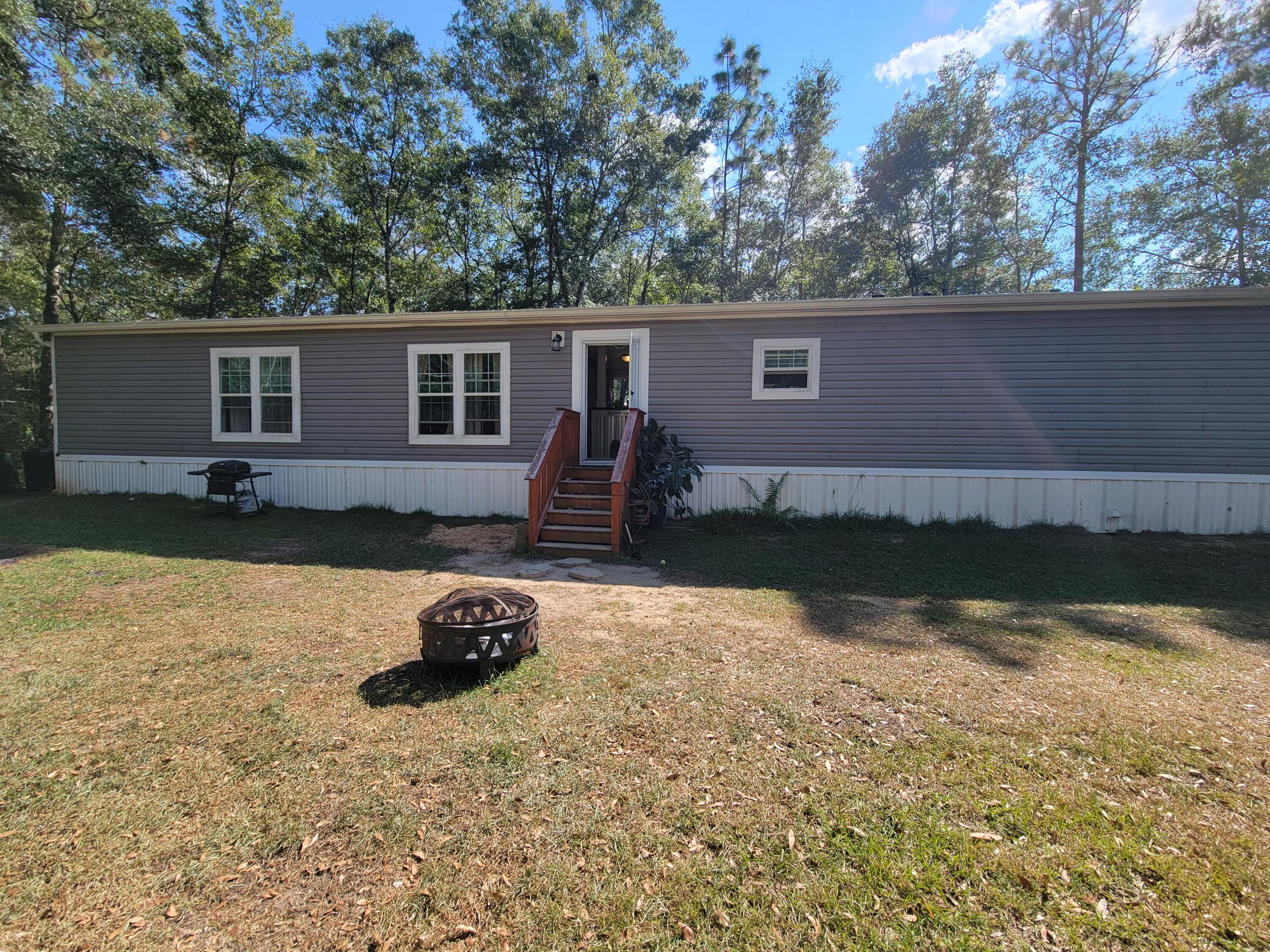 So nice!  This well kept 2020 Oaks Signature Series- Single-wide mobile home with is a 16'x80' with 1130 sq. ft. of living area on  85'x170' lot just off Oakwood Lakes Blvd.  This home has been well taken care of that comes with all the appliances, even washer and dryer.  You have a master suites on one end and the 2nd large bedroom on the other end of the home with a lot of space for the living room/dining area, granite top breakfast bar and kitchen.   Separate Laundry Room.  CLICK  on ''Document Tab'' ABOVE to see the floor plan and Seller's Disclosure. Make sure your pre-approval letter specifies that your Lender will finance a SINGLE-WIDE mobile home.  Call for an appointment right away.