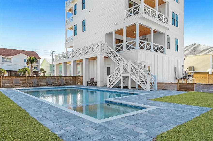 This home is a must for any savvy investor looking to own an entertainment oasis with great ROI potential. Discover the ultimate escape with this magnificent custom built 8-bedroom, 8.5-bathroom vacation rental on peaceful Navarre Beach. Designed to accommodate up to 32 guests, this 4,511 sq ft luxury home offers high-end finishes and comfort. Embrace coastal living with a rare 4th-floor gulf-facing deck that boasts breathtaking views and over 1,100 sq ft of outdoor space, including a large private pool and an outdoor kitchen deck area perfect for gatherings. This expansive 360 degree water view beach home is an excellent investment opportunity. This spacious home with its massive corner lot, offers considerable flexibility. The expansive outdoor area provides a blank slate for future enhancements, with potential for landscaping upgrades, a garden, or recreational spaces such as a pickle ball or tennis courtall appealing to future renters or buyers seeking room to relax or entertain. Step inside to find high ceilings and energy-efficient features throughout, complemented by top-of-the-line appliances and luxury furnishings. This homeowner spared no expense and thought of every detail to make this home the best option on the beach! Almost every room has its own bathroom in-suite. This impressive home also has several master suites with water views. The expansive bunk rooms provide ample sleeping space for everyone. An elevator adds convenience for travelers returning from the beach and are ready to relax. This home already has rental income that will be transferred over to the new owners. 

Just a short stroll will bring you to the white sandy beaches, offering endless relaxation. Stop by the longest pier in Northwest Florida on Navarre Beach. You're so close to Pensacola and Destin, but just far enough to keep the serene and peaceful beaches to yourself. Rated as one of the top beach house locations in the U.S., Navarre Beach is known for its sugar-white sands and sublime national seashores. If you're looking for an exclusive and serene experience, this stunning rental property is the perfect choice. Don't miss your chance to own a piece of paradise in one of Florida's most alluring destinations! Life is short! Buy the beach! With its prime location and luxurious amenities, this home is not just a residence but a lucrative venture waiting to be maximized. Potential owners will appreciate the perfect blend of comfort and opulence that caters to large groups seeking a memorable beach experience. Whether you're considering it for personal use or as an investment, this property promises endless possibilities.