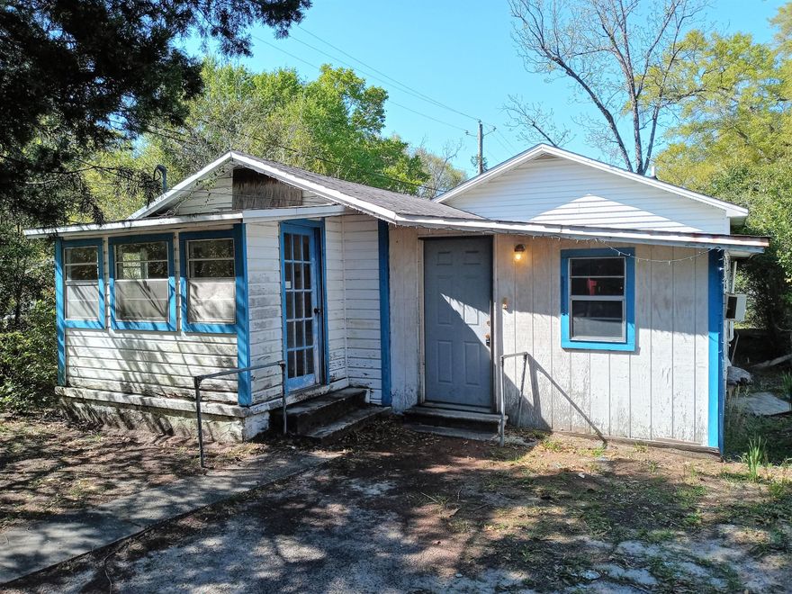 A true handyman special, with the right vision and some hard work this property could be a cozy Florida cottage. This 1940 fixer upper was originally built as a 2/1 with 1,000 sq ft. Over the years there have been some additions. It is now almost 1,200 sq ft with 3 bedrooms and 2 bathrooms. There is an enclosed porch off the front of the house, and a detached storage shed in the backyard. The house will need quite a bit of work but has TONS of potential.