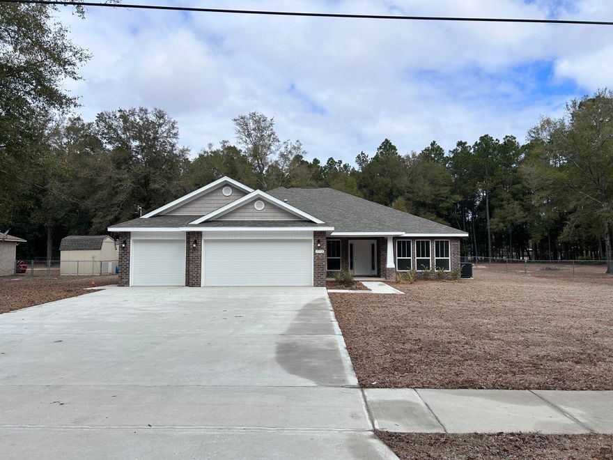 *Move In Ready New Construction on Large Lot *$15K Your Way on this home which can be allocated towards Interest Rate Buy Down, Closing Costs and/or Prepaid Items (certain restrictions apply) * This Plan Features: 2 x 6 Exterior Construction, 3 CAR GARAGE, 4BR/3BA & Morning Rm, Flex Rm, Dining & Breakfast Cafe * 10 Ft Ceilings & Laminate Wood Plank Flooring in Main Living Areas * Granite Countertops Kitchen & Baths * Tile Flooring in all Baths*  Kitchen: Granite Island, Stainless Steel Appliances & Walk In Pantry * Soft Close Cabinetry * Main Suite w/ Trey Ceiling & Main Bath with Builders Signature Zero Entry Walk in Tile shower w/ 2 Shower Heads, Separate Soaking Tub, Double Vanities & Large Walk-in Closets * Ceiling Fans All Bedrooms, Family Rm & Rear Covered Lanai * Irrigation & more.