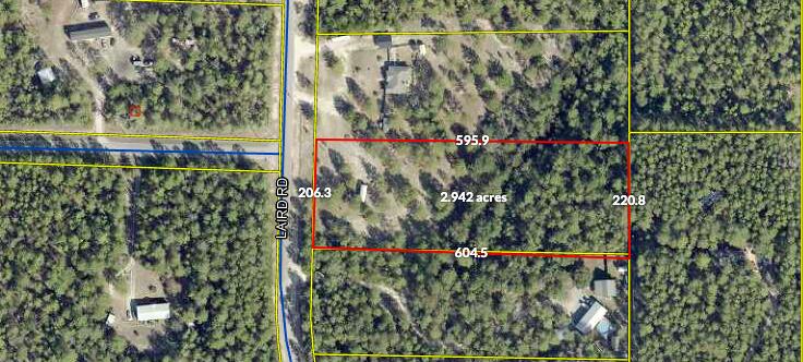 Bring your building plans, this beautiful parcel of almost 3 acres is partially cleared, has a power pole, water tap, and septic tank already here,  ready for you to put your dream home on!! Shed does not convey.