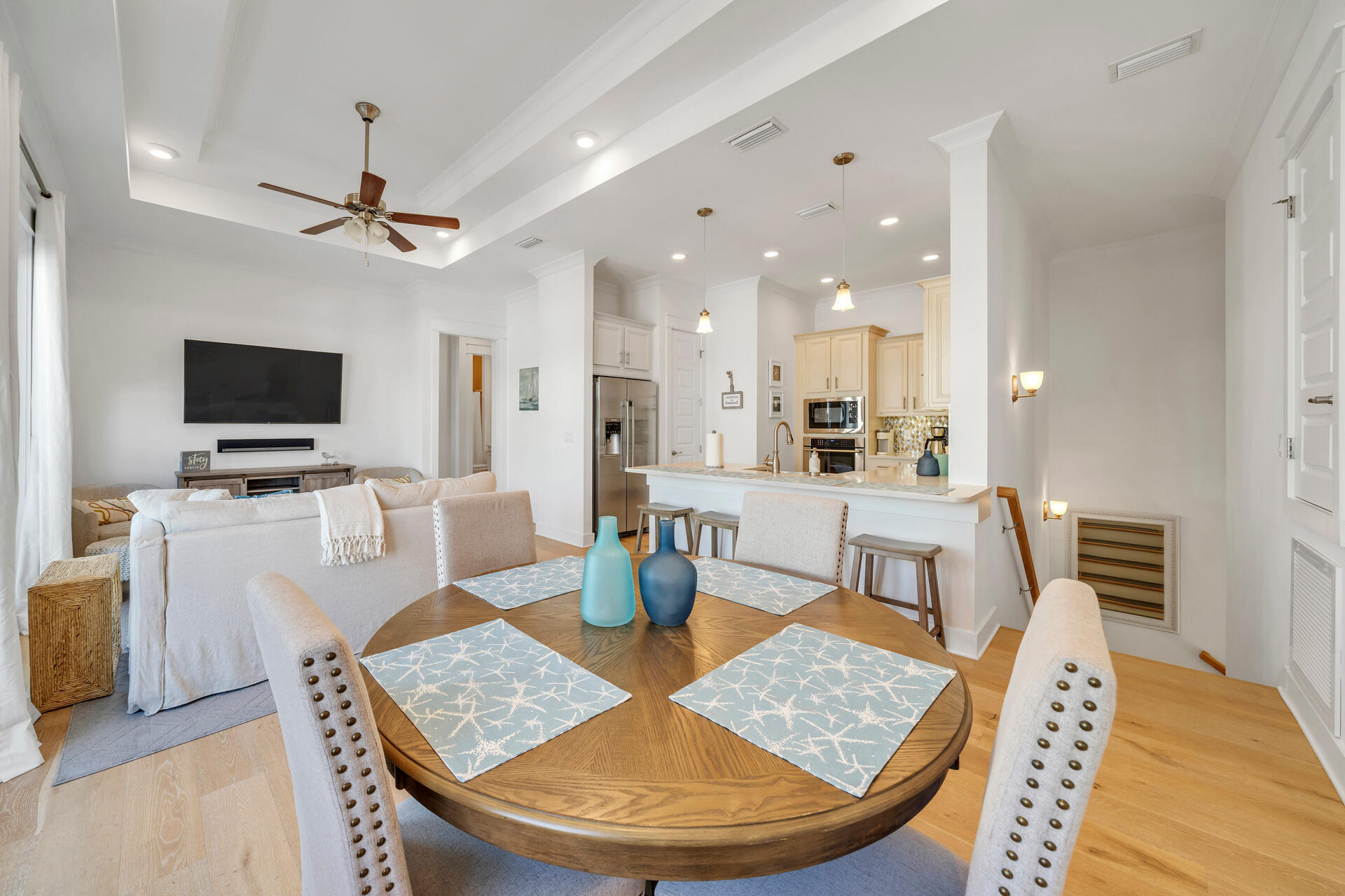 The features abound in this TURNKEY READY townhome in Prominence. 10' tray ceilings, crown molding, quartz countertops, all stainless-steel kitchen appliances, recessed lighting, Sonos Home Theater System, brand new furnishings and decor, commercial epoxied garage floor and more! The open living area is graced with gorgeous natural light from the windows and French doors lining the balcony. The master bath offers a spacious walk-in closet, quartz double vanity, and a three-source water system including rainfall annex shower system walk-in shower. The gourmet kitchen boasts Electrolux stainless-steel appliances, farmhouse sink, gas stove top, built in microwave and oven, and under cabinet lighting.