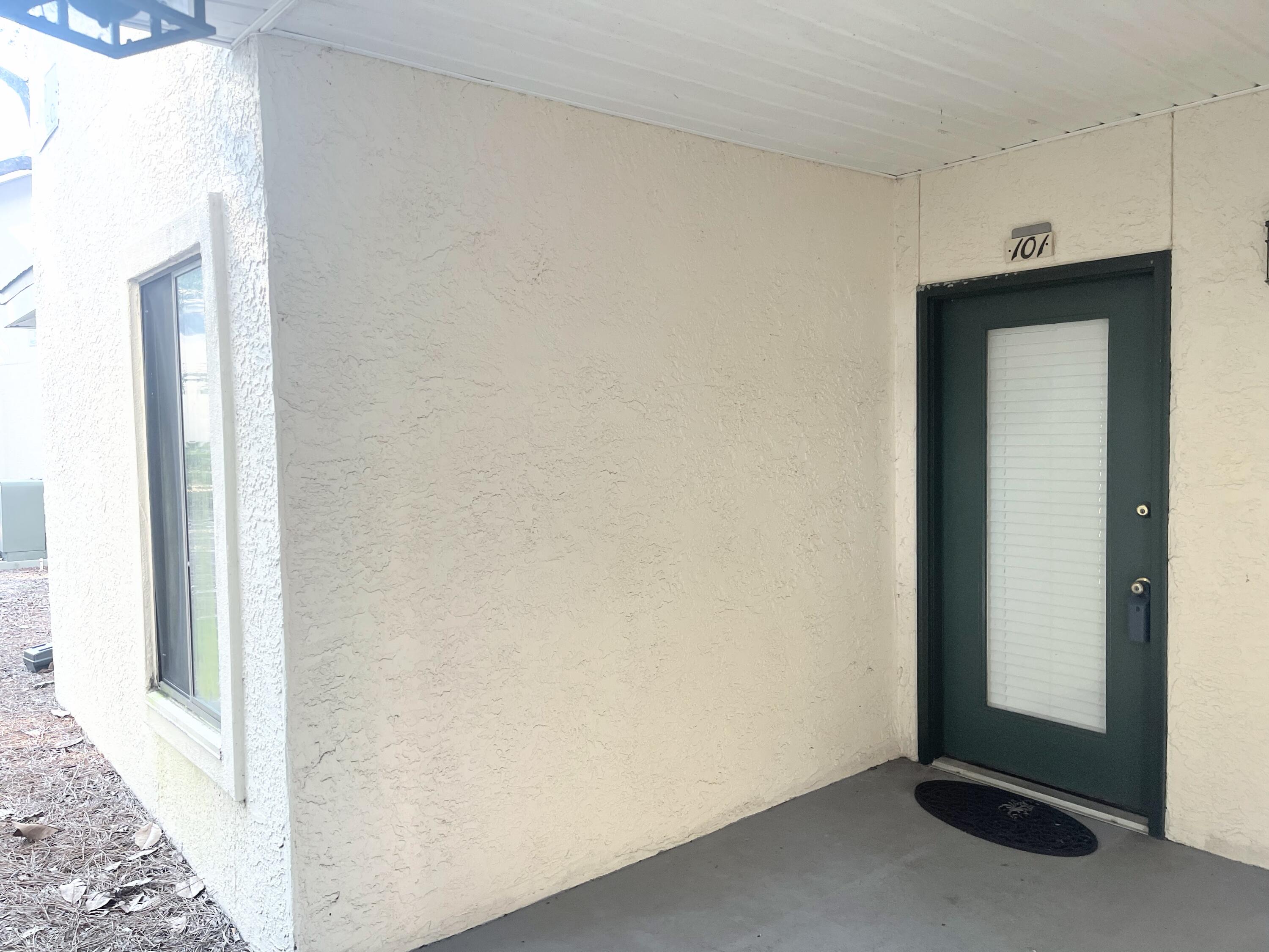 Wonderful lower level end unit condo!!!Great roommate unit each bedroom with their own bath. Nice kitchen with eat in space, pantry, stackable washer and dryer, stove and microwave plus a nice size refrigerator, ready for move in living. Master large enough for King size bed and custom built in's for your closet space. Double vanities in master, bath and tub shower combo.Lot's of windows in this well maintain corner unit that overlooks the lake and beautiful hardwood trees., from a covered patio.
