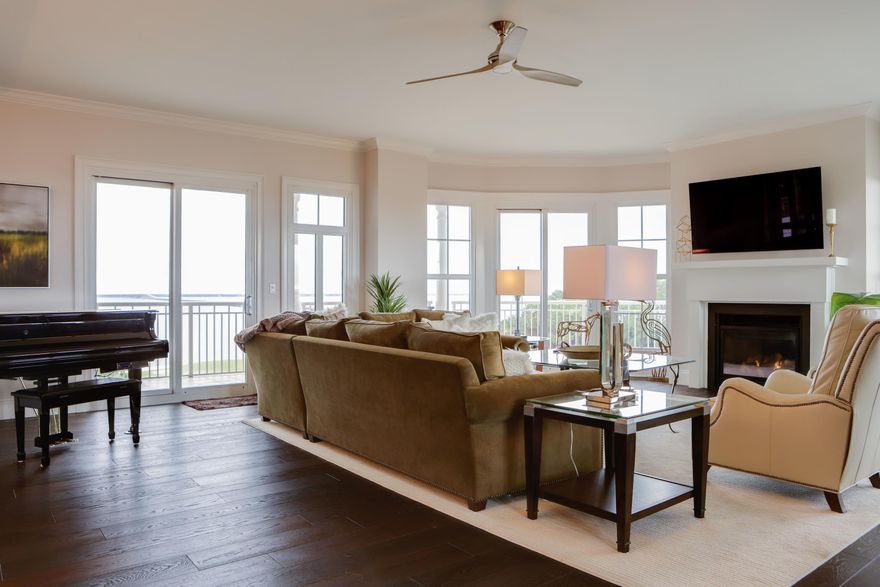 Come experience One Water Place, Destin's most luxurious condominium complex. Located on the bay, secure behind guarded gates, One Water Place is truly the finest county club living.This recently renovated unit's floor plan offers 3,220 SF of living space and features a huge wrap-around porch for entertaining and enjoying spectacular views. It overlooks the bay and the signature 4th hole of the Championship Kelly Plantation Golf Course. A private elevator delivers you into your unit.The spacious condo boasts of beautiful hardwood floors, a gas fireplace, and lots of natural light from the many windows. Kitchen features include new marble counters, Viking stainless steel appliances, a gas cook top, and a large breakfast bar. New outdoor kitchen grill. Garage GolfCart space included#