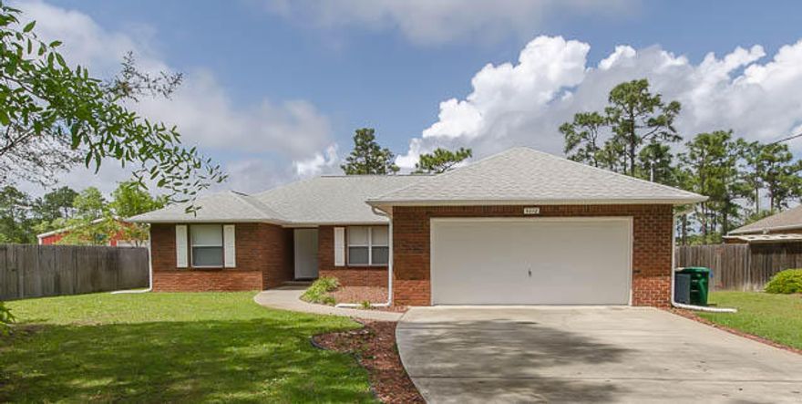 This CHARMING 3 Bedroom, 2 Bath BRICK house is ready for you to call it HOME! As you enter the home you'll notice a very spacious OPEN FLOOR PLAN with VAULTED CEILINGS. The SPLIT FLOOR PLAN allows for privacy on both ends of the home. In the MASTER SUITE, the LARGE BEDROOM and BATH with DOUBLE VANITY, GARDEN TUB, SEPARATE SHOWER and WALK IN CLOSET will make you feel comfortable. With over a half an acre, convenient location to SCHOOLS, SHOPPING, THE BEACH, and HURLBURT AFB, this home is a MUST SEE!!!