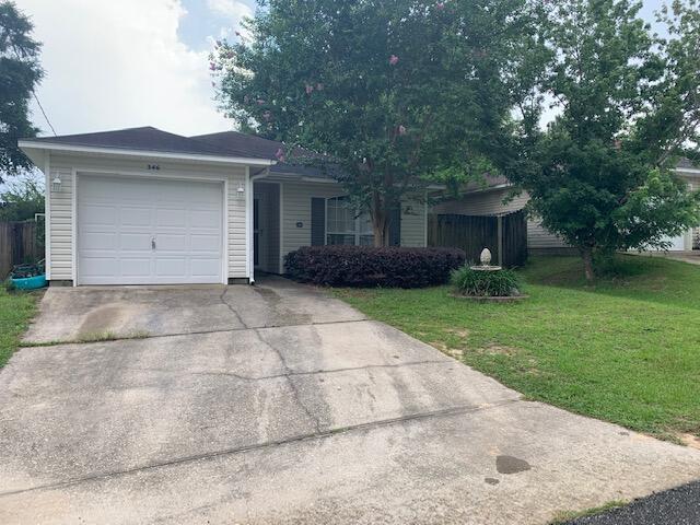 Back on the market by no fault of the seller. Look at this ADORABLE home SOUTH of I-10 in Crestview! This well-maintained home has beautiful laminate flooring in the living areas and bedrooms and tile in the kitchen and bathrooms. The VERY low maintenance private yard requires no mowing in the back because of the back deck. The open floorplan is light and bright and the bedrooms are pretty roomy. Seller put a partion wall in the garage and uses that room as a 4th bedroom which is and remaining portion of garage as storage. The master suite features a bath with a dual sink vanity, a soaking tub and a great closet. If you are looking for EASY living south of I-10 in Crestview at an amazing price, you have found your new home!