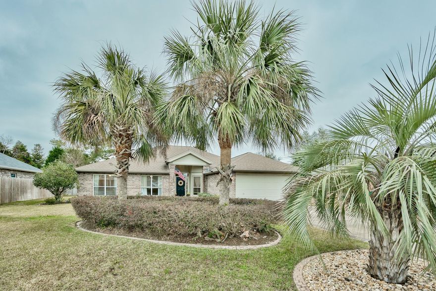 Don't miss this opportunity for a beautiful 4-bedroom, 2-bath home in a quiet neighborhood near the Bay! Raintree Estates is a conveniently located community near the Mid-Bay bridge and offers a soccer field and fantastic community beach park on the Choctawhatchee Bay with picnic tables, outdoor fire pit, communal library box and easy access to the Bay. Interior has been impeccably maintained and freshly updated with new luxury vinyl flooring, new paint, custom tile and marble fireplace trim, new HVAC system, smart thermostat, added utility shed, backyard fence & sprinkler system. The home is one level with a 2-car garage, screened-in lanai, huge backyard and is nestled on a spacious 0.30 acre lot. There is beautiful curb appeal with mature palm trees at the entrance for a tropical feel!