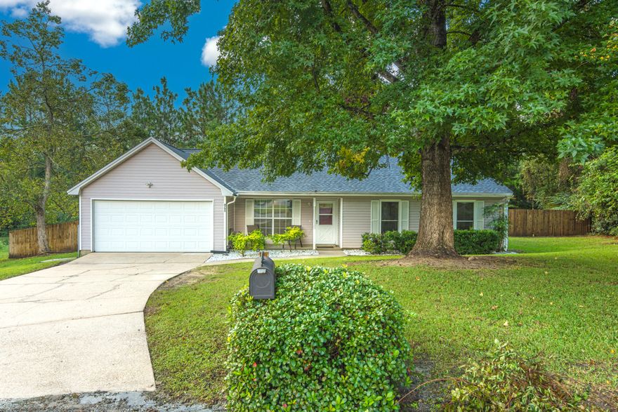 2021 roof and well kept south of I-10!Be ready to sip your morning coffee on your covered front porch in this quiet cul de sac!When you walk in the door you are welcomed to the foyer area and great room that features vaulted ceilings and a wood burning fireplace.To your right you will find french doors to a sizable room that can be used as an office or 4th bedroom.To your left you will find a separate formal dining area. The kitchen is ready for cooking with gas stove and tons of counter space w/ an island.There is also a breakfast nook area with bay windows showing the HUGE fully fenced wooded backyard that features an open patio and complete privacy with no neighbors behind you.The master bedroom has plenty of room and offers a master ensuite with a walk in closet.Book your showing today