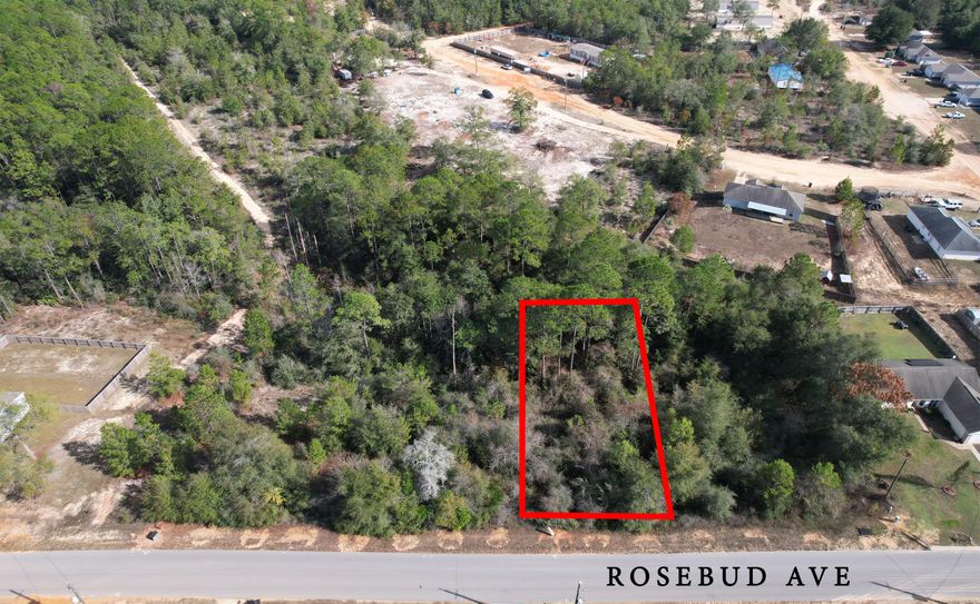 1 of 3 adjacent lots available in the fast growing community of Triple Lakes Estates! Easy quick access to Highway 90 and I-10. Away from the traffic and noise of the city. On a paved road. Public water is available at the location, no well is needed. Surveys available. Seller will consider owner financing with appropriate terms.