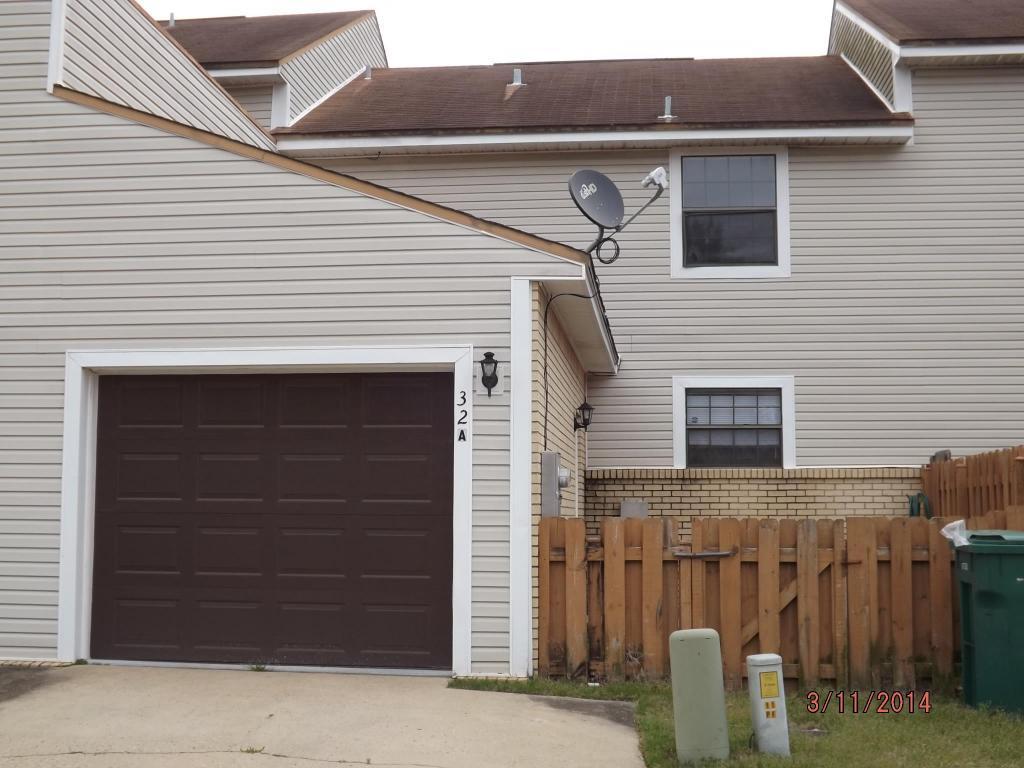 NEW ROOF(2014)/ New Dishwasher/ Nice townhome in sought after Portofino. Move in, in time to start enjoying the pool this summer! 2 large bedrooms upstairs share a Hollywood bath and each has their own sink area. Large living room, eat-in kitchen and 1/2 bath downstairs./ single car garage / small, fenced courtyard for your pet. The Association is responsible for the repair and replacement of roofs and the exterior of each unit, less a $250 deductible per occurrence.Large Oak Trees,Azaleas, Community Patio area and Swimming Pool