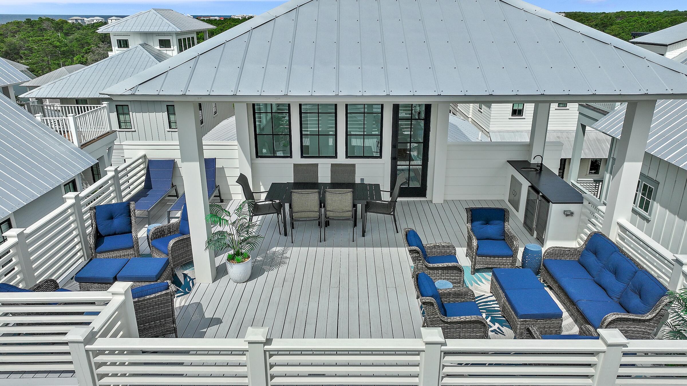 This California coastal-inspired home on Grande Pointe Drive offers a perfect blend of elegance and a relaxed beach feel. With three floors of indoor space, an elevator, and upscale finishes, the home exudes sophistication. Expansive covered porches and a rooftop terrace provide stunning Gulf views, capturing  the relaxing feeling of enjoying nature. Grande Pointe community is located on the largest coastal dune lake in North America,picturesque Lake Powell, which pours into the Gulf of Mexico offering many water sport activities. Golf cart to popular 30A Avenue's dining, shopping, and entertainment. Take advantage of the new handicap accessible pedestrian tunnel built under 98 hwy, ride or walk to Rosemary Beach and the iconic 30A. Call to see this truly beautiful home today.