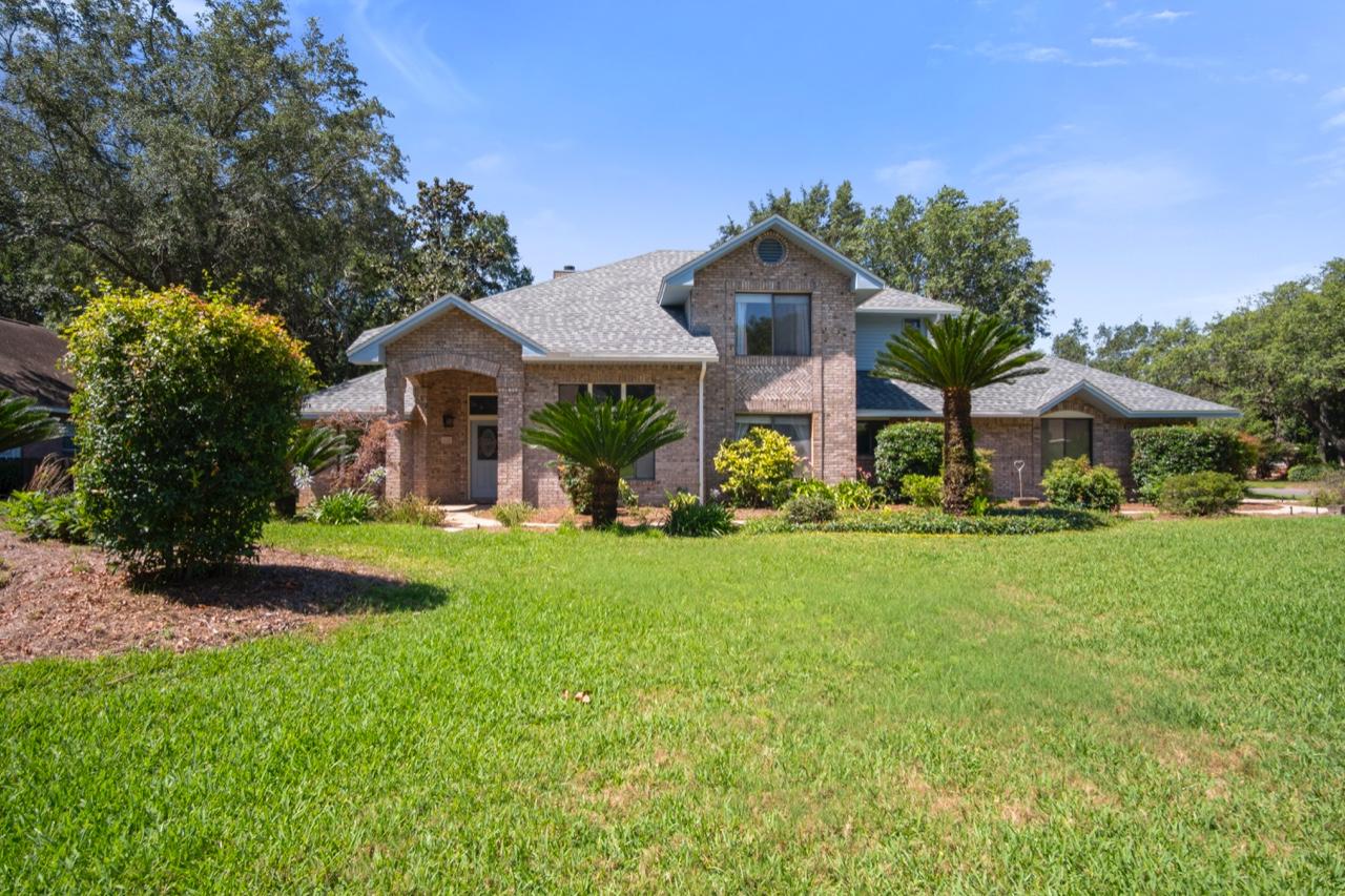 This beautiful executive home is located in one of Bluewater Bay's premier gated waterfront neighborhoods with a private beach and dock for swimming, paddle boarding and kayaking. Located on a large corner lot this gorgeous home has a private pool and covered porch perfect for entertaining. This home boast soaring two story ceilings in the family room which opens up to the updated kitchen. You will find the master suite on the first floor as well as a guest bedroom and bath. Two bedrooms and a loft are upstairs with a jack and Jill bathroom. Don't miss the opportunity to call this your home and enjoy the fine coastal living this home affords.
