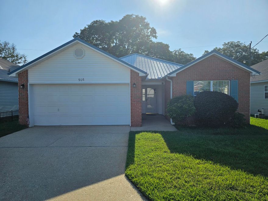 Stunning Solar-Powered Home with Metal Roof and Exceptional Features  Average electric bill: $26 per month!  Introducing your ideal residence, complete with solar-powered system and a durable metal roof. Enhanced with an upgraded HVAC system and hot water heater this offers numerous additional features for unparalleled comfort and convenience.Home really is move in ready!Solar will be paid off at closing at a cost of 30K. HUGE saving for new owner.