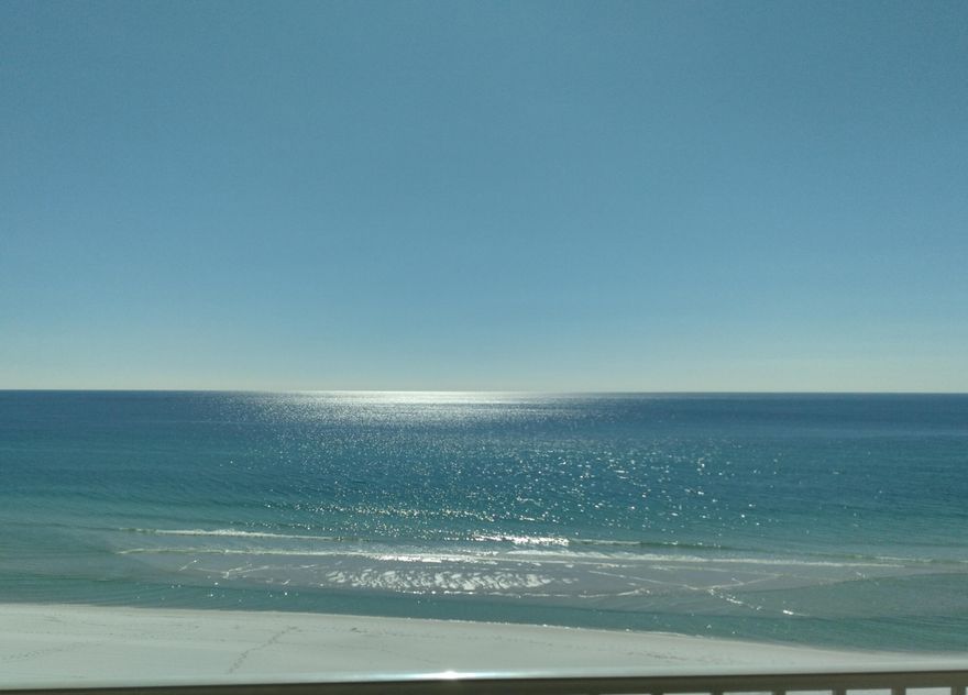 Enjoy the sunrise and sunset from your private balcony on this lovely Gulf front condo over looking 630' of pristine sugar white sand and Emerald water of the Gulf of Mexico.  Featuring tile throughout, a walk in shower in the master bath, new a/c and kitchen cabinets.  Take a bike ride or walk along the five mile path of Scenic Gulf Drive  or to the World's Luckiest Fishing Village on the Destin Harbor and 30A with great local seafood, live music, golf and shopping.