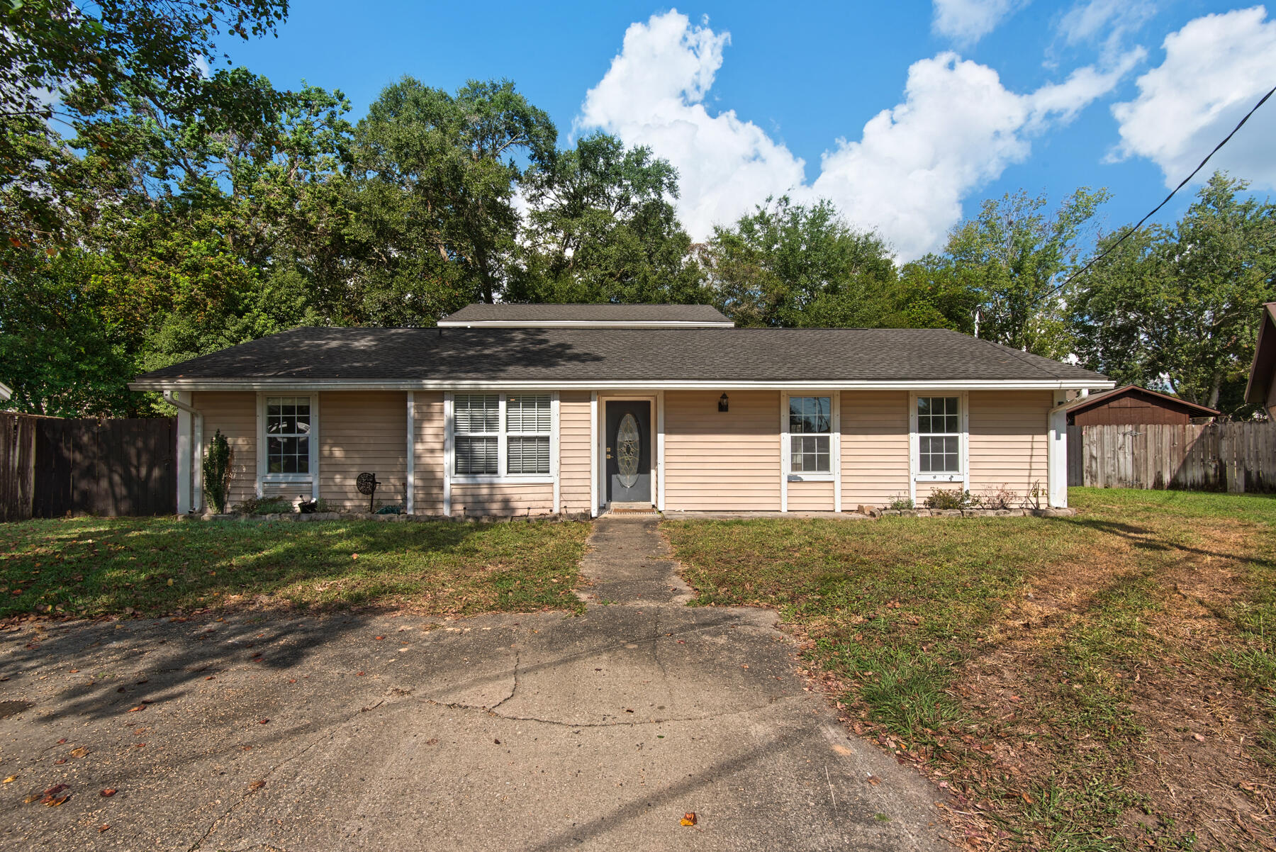 Great cul-de-sac living in the heart of Fort Walton Beach. This home has an entire second floor dedicated to the Master Suite. Boasting a huge walk-in closet and a beautifully remodeled bathroom with a soaking tub/shower combo. There is a smaller master suite on the first floor with wood plank tile and over-sized vanity in the bath. Two more bedrooms and a full bath are located on the first floor. Tons of natural light shines through the eat-in kitchen. Granite countertops and stainless appliances are ready for the chef in your family. A huge bonus room off of the kitchen, a large laundry room and a designated dining area make living easy with tons of space! You won't believe the oversized living room/den area. This space has a door to the backyard for ease of use. Speaking of the fenced backyard...it is a blank slate and ready for you to make it your own. You've got to see this one!
