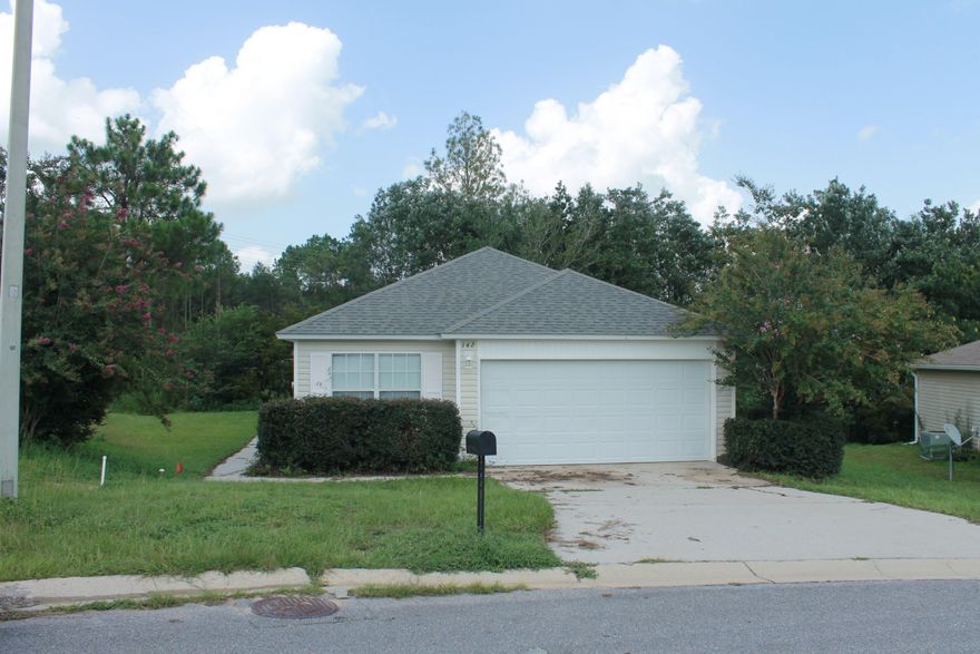 Wonderful home in a convenient neighborhood on the SOUTH SIDE OF CRESTVIEW. The home has been freshly painted and has new laminate floors in the main areas, new carpet in the bedrooms and new tile in the bathrooms. The living room has a vaulted ceiling and plenty of natural light. All windows have 2'' faux wood blinds. The master bedroom has a spacious walk in closet. All bedrooms have ceiling fans. Stackable washer and dryer is included with the home. Out back is a wooden deck with plenty of room in the side yard. There is a two car garage for parking. Call today to schedule an appointment.