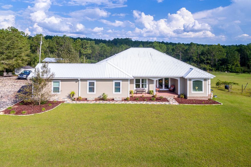 Spectacular Open View, Perfectly Terraced/Cleared Pasture Land, Immaculate High-End Home, Elevated Outdoor Entertainment Area Overlooking the Heated Pool, Hot Tub, and Beautiful Valley with Babbling Brook. Click on the photos to discover a wide array of amenities to make life on the farm real comfortable and enjoyable! As you enter the home you will witness a great layout with so many quality featuresit is truly built beyond expectations! The upscale finishes and appointments abound for an engaging home that you will be extremely proud to share with friends and family. That's only the beginning because wait till you see the Huge Entertainment/Hobby Barn! There is even the opportunity to build another house on the acreage. Love the Country? Want something Truly Unique? This is it!