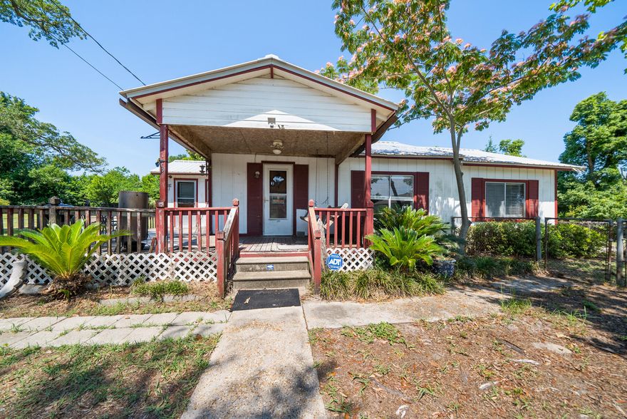 Spacious 'As Is' home nestled on an expansive land parcel spanning five lots. This property offers endless potential for renovation or redevelopment in a serene residential setting. With ample room to customize and expand, it presents a unique opportunity for investors or buyers seeking to create their dream home in a desirable location.