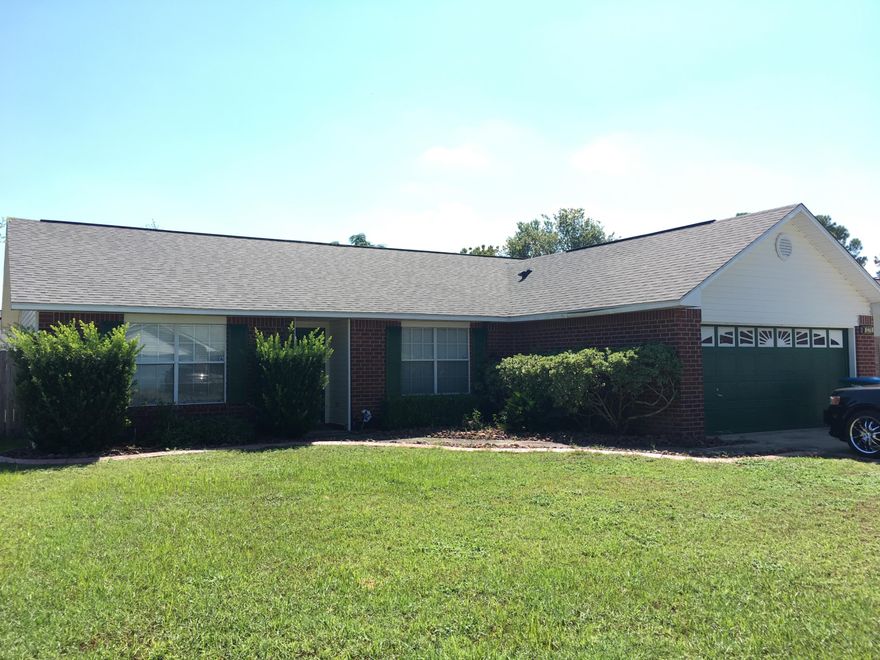 BEAUTIFUL HOME conveniently located south of I-10! This 3BR/2BA brick home has really been well maintained and it shows well ! Brick faced fireplace, plant shelves, tile floors in the kitchen, baths, foyer & laundry. 2 car garage. Large flat lot. Back patio and driveway have been kover kreted. Roof was replaced March 2015 and a new water heater was installed April 2016!! Don't miss out call today!!